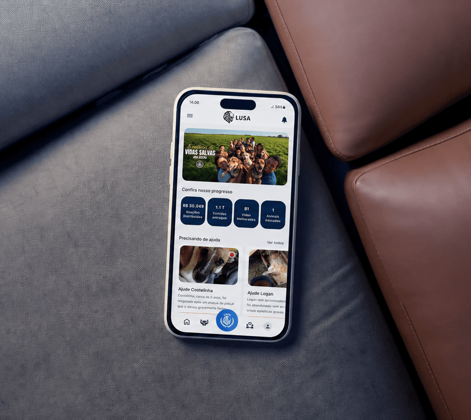 Smartphone showing the LUSA app on a leather sofa